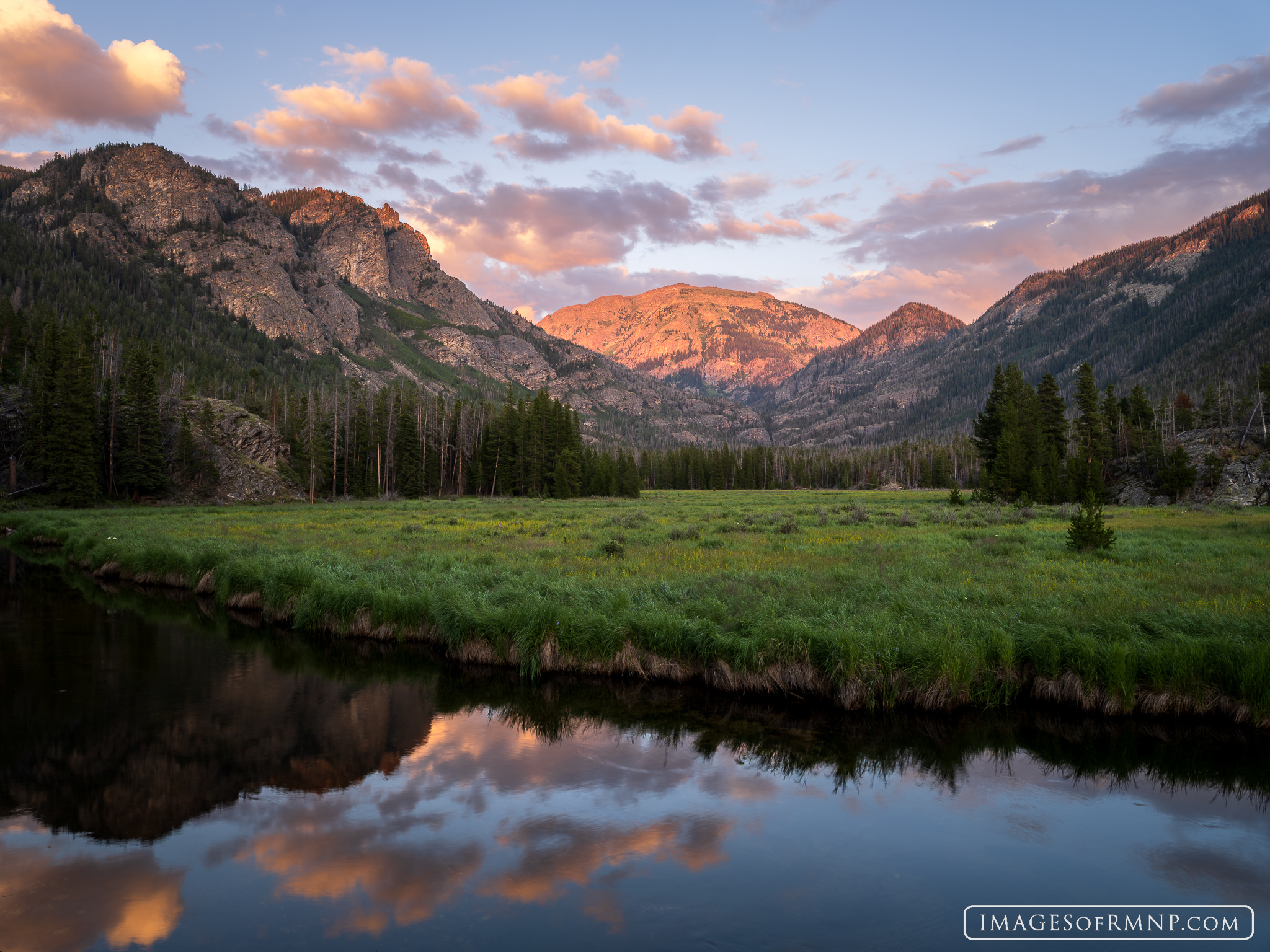 Mount Craig, often called Mount Baldy, looks down on the East Inlet as it gently winds its way through East Meadow on a perfect...