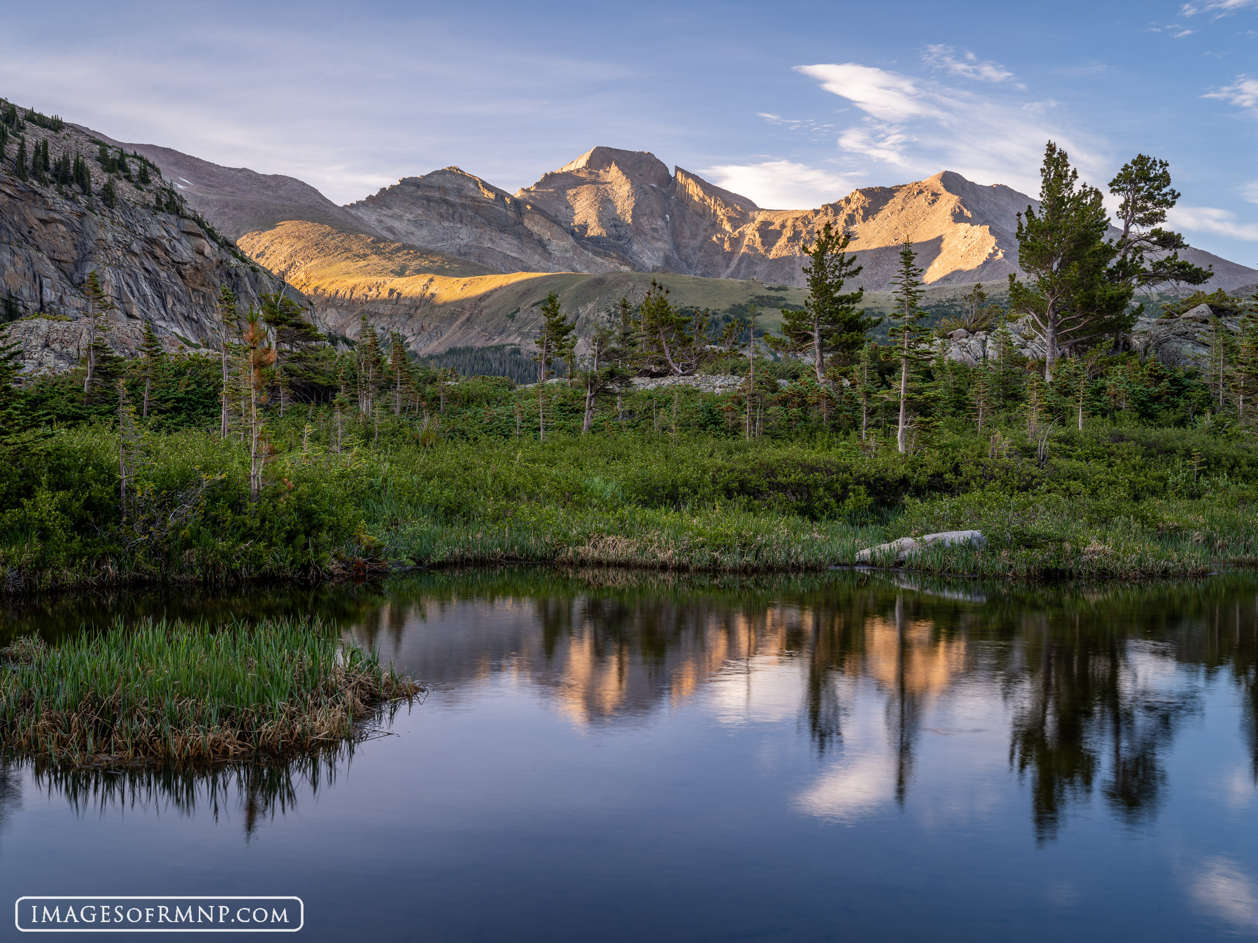 Pagoda Mountain, Longs Peak, and Mount Meeker show off their hidden side. This view of these well known mountains is from a small...