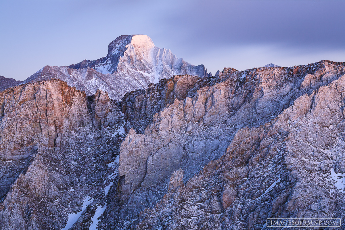 I had just finished shooting sunset on top of the Continental Divide and was on my way back down Flattop Mountain. The sun had...