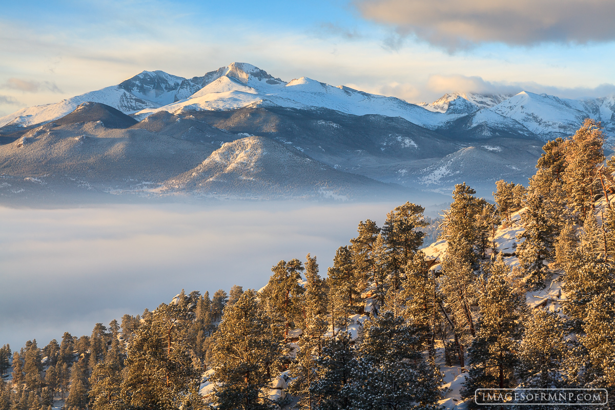 After several days of clouds and snow the storm broke, though Estes Park was still under a thick blanket of clouds. I was up...