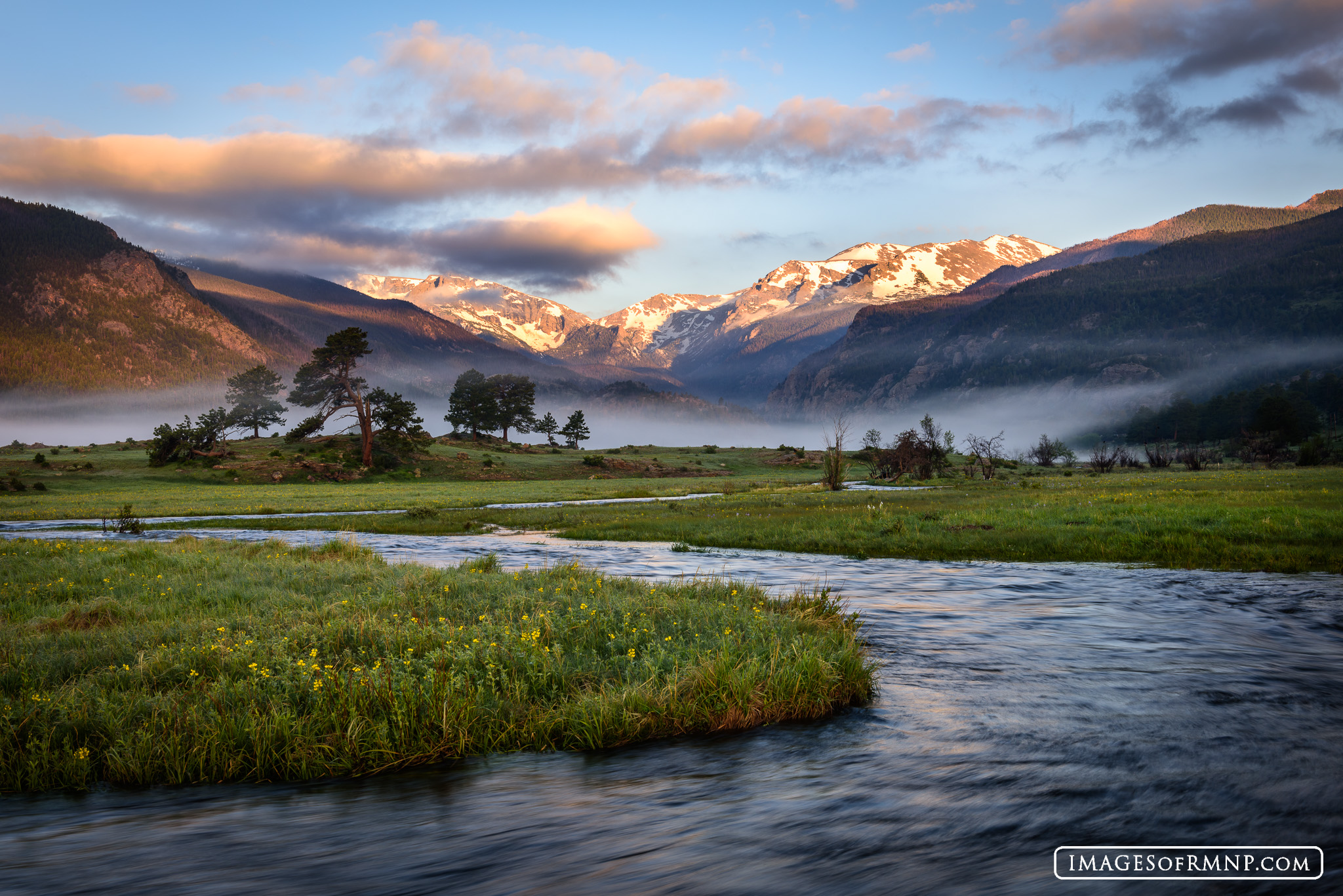 The day began with thick clouds and fog, but as the sun rose they parted to reveal the snow covered peaks of the Continental...