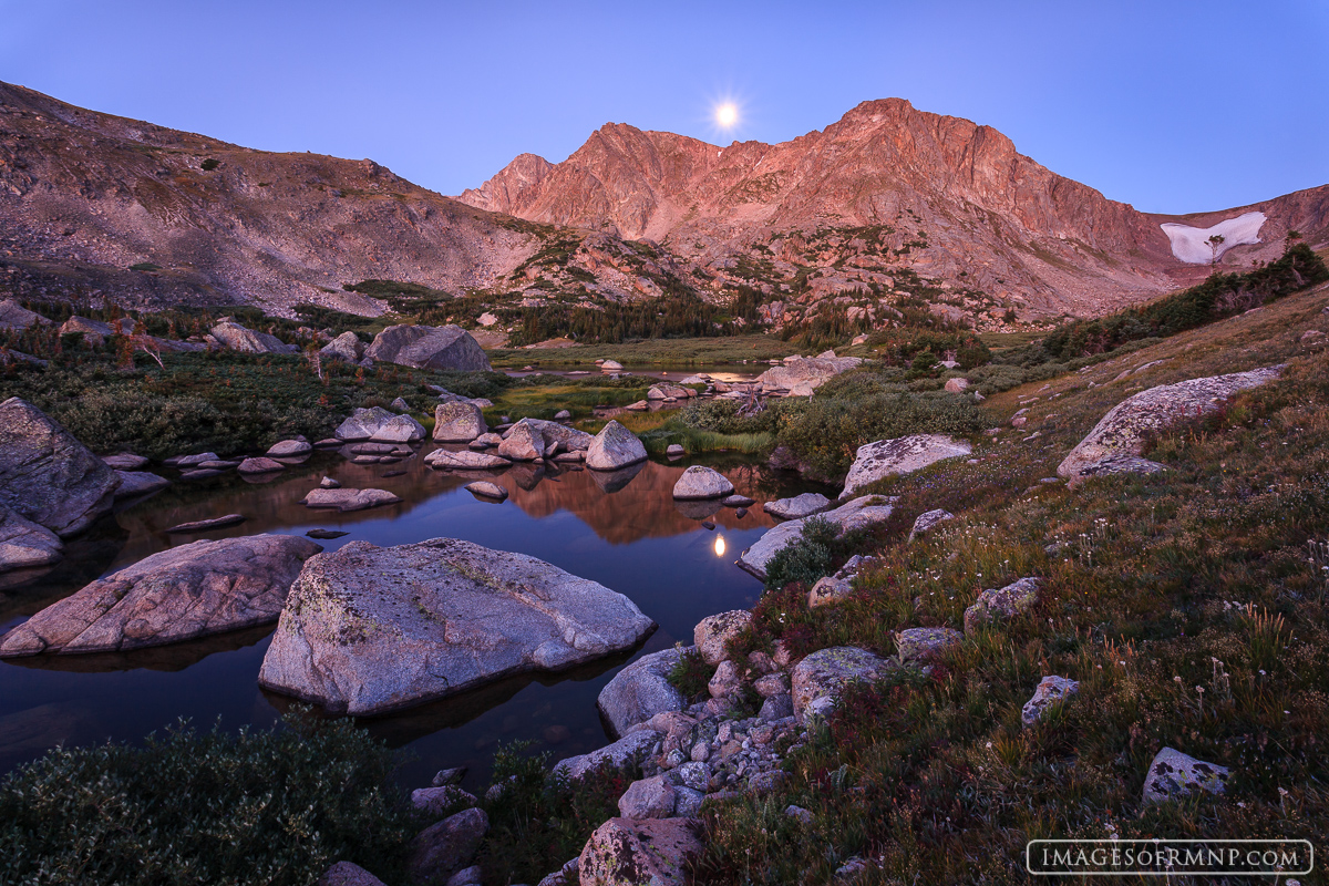 The moon was setting and the sun had still not yet risen, yet the mountains were glowing in an unusual pre-dawn light. Although...