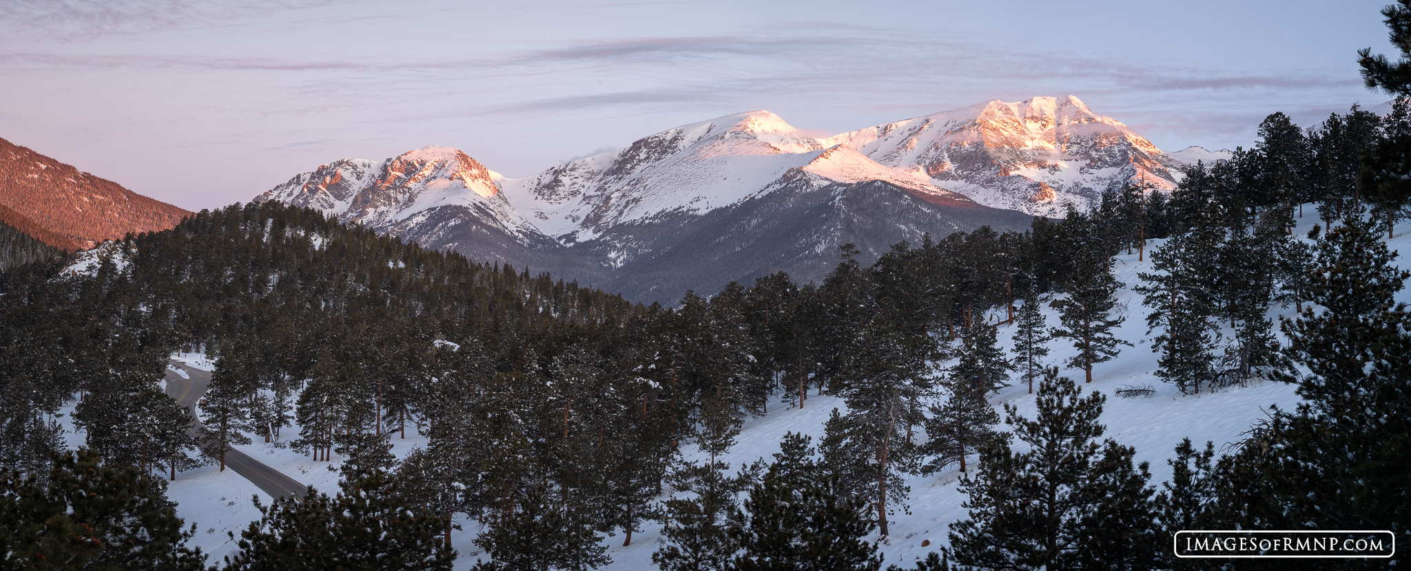 Chapin, Chiquita, and Ypsilon Mountains awaken to the warm light of a new day. Though it is March, snow hangs heavy on the peaks...