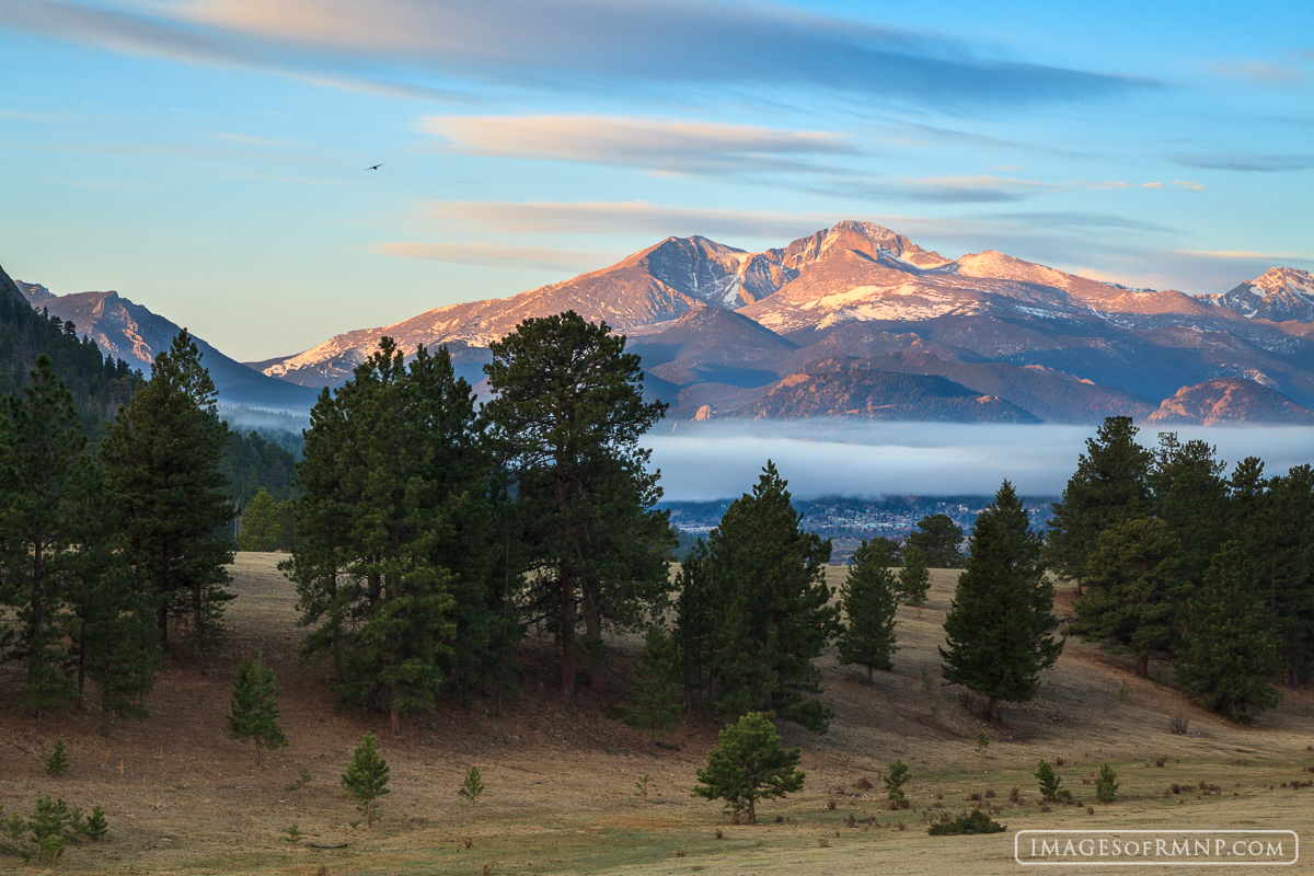 On this April morning fog settled over the Estes Valley while gentle clouds drifted above. This type of weather rarely happens...