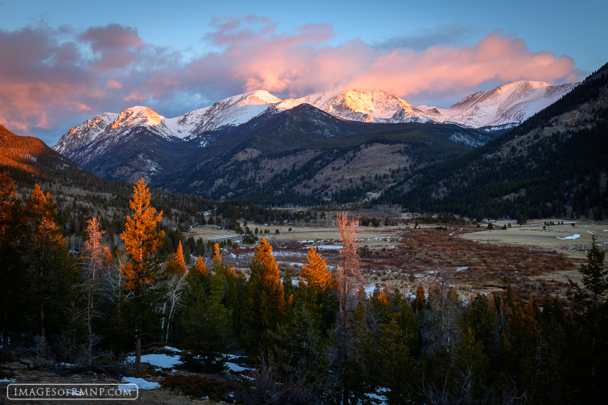 As the day broke, the cool pre-dawn colors gave way to the warmth of the rising sun. Its warm glow first lit the snowy peaks...