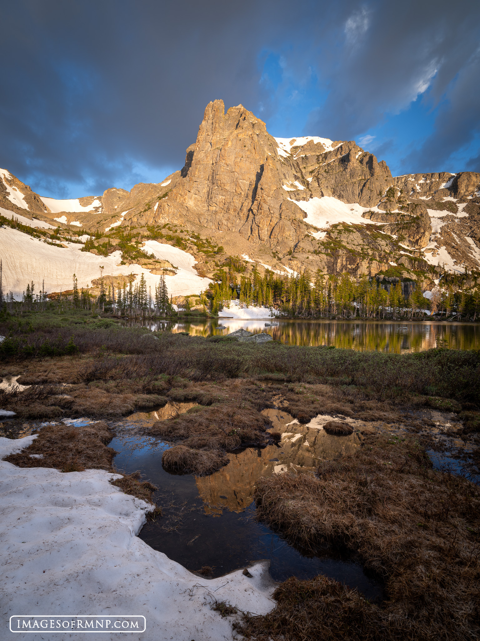 As the last of the snow gives way to the warming weather, Notchtop Mountain stands proud in the first light of the summer. This...