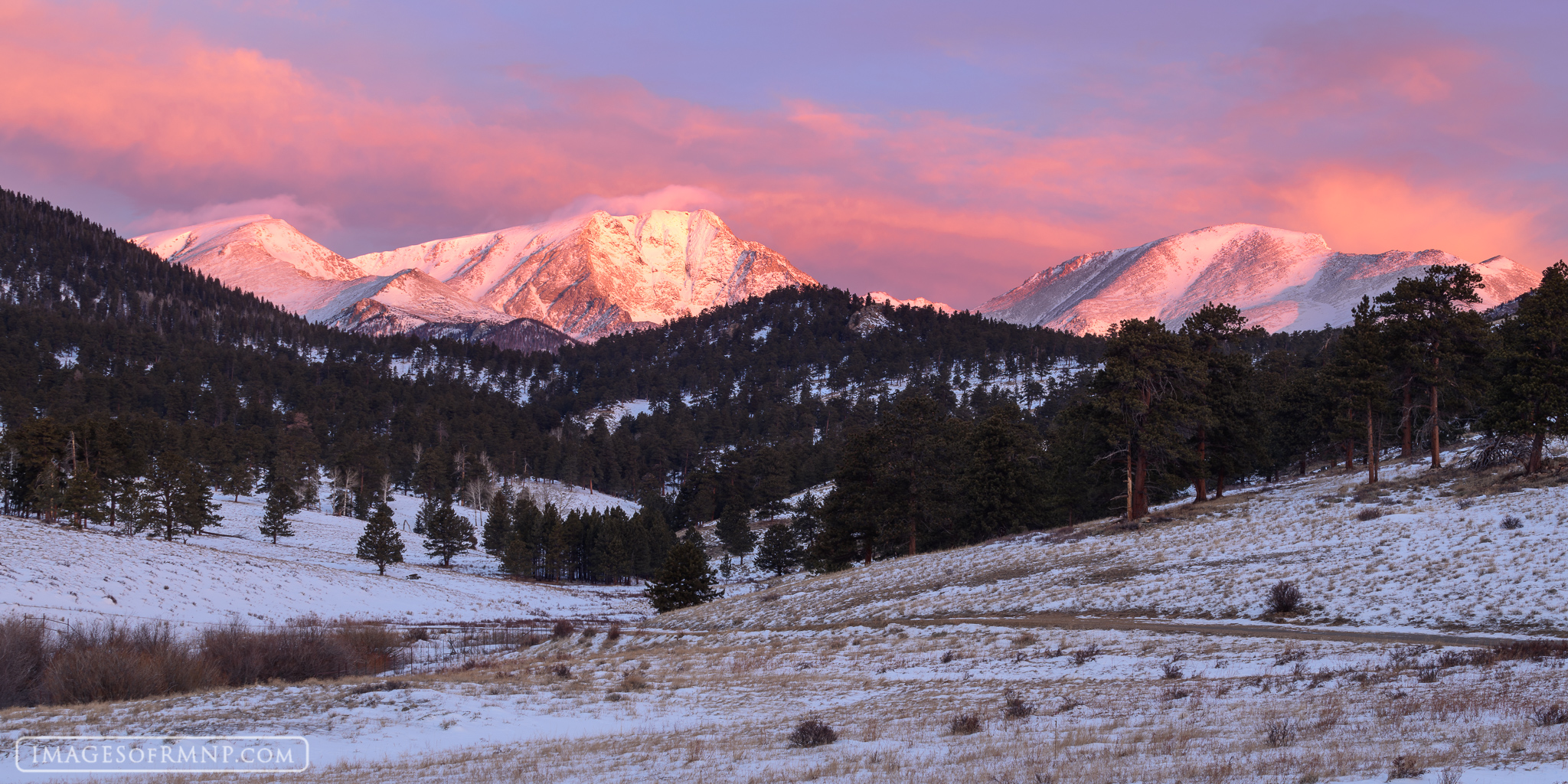 On a cold January morning the Mummy Range glows with brilliant pastels as seen from Beaver Meadows.