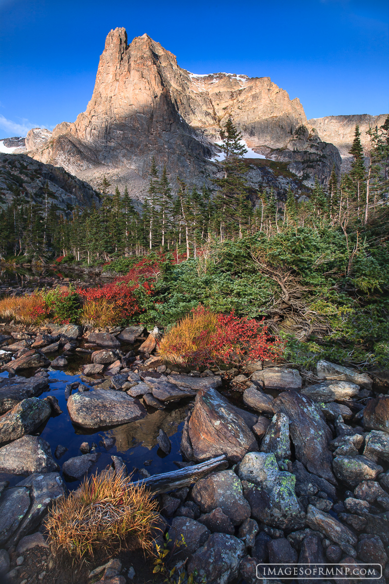 Autumn colors abound below Notchtop Mountain on this beautiful autumn morning.