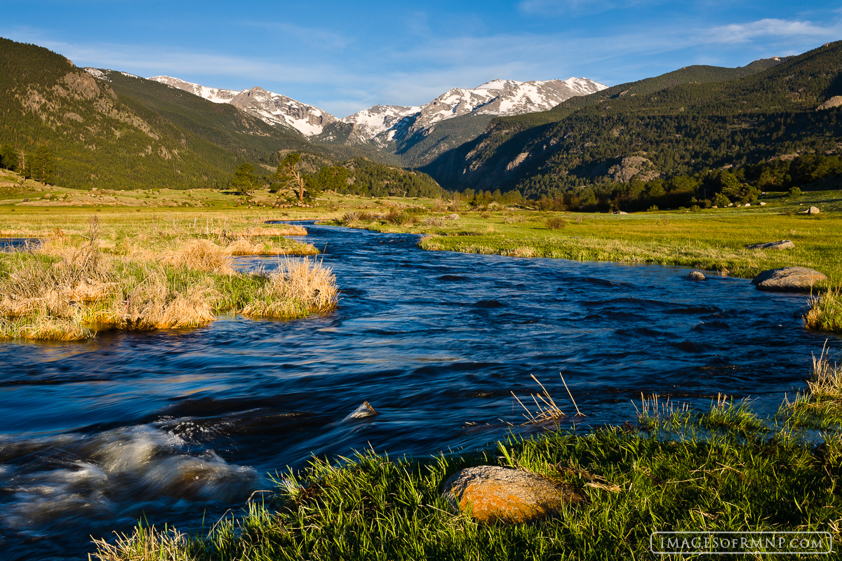 Moraine Park is one of my favorite locations in June. It comes to life with vibrant greens while the mountains are still covered...