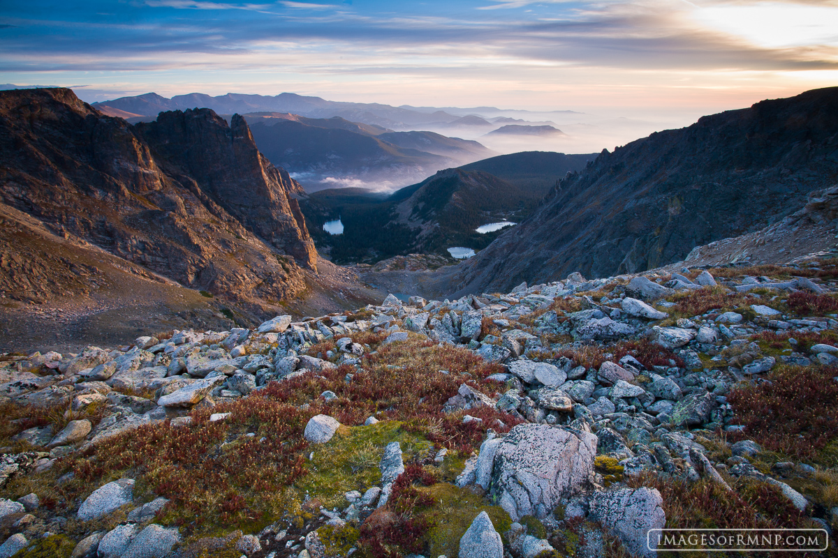 A view from Flattop Mountain looking northeast about twenty minutes after sunrise. It is autumn and the tundra grasses are beginning...