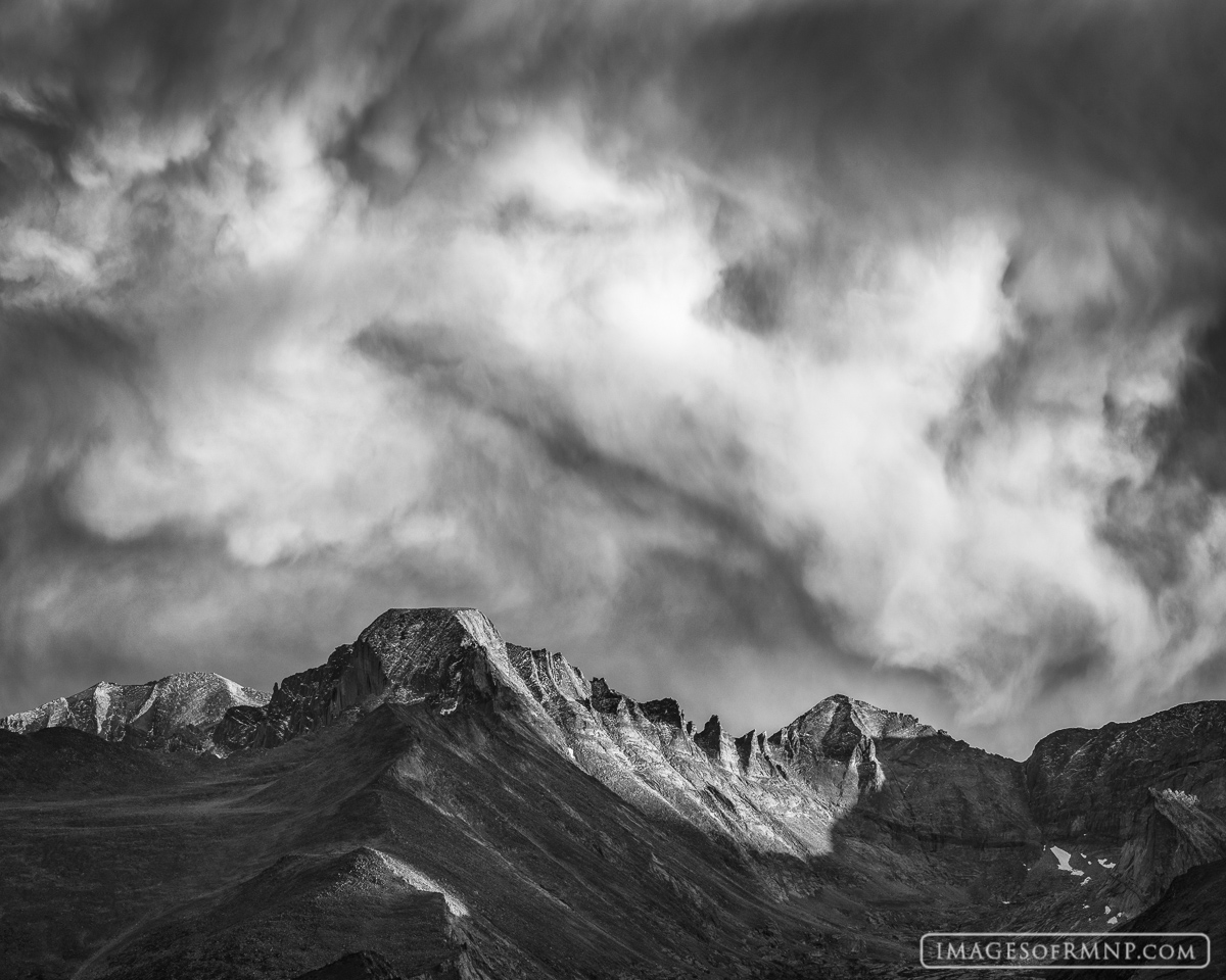 Those who know Longs Peak well realize that this mountain has both a calm beautiful and majestic presence as well as a stormy...