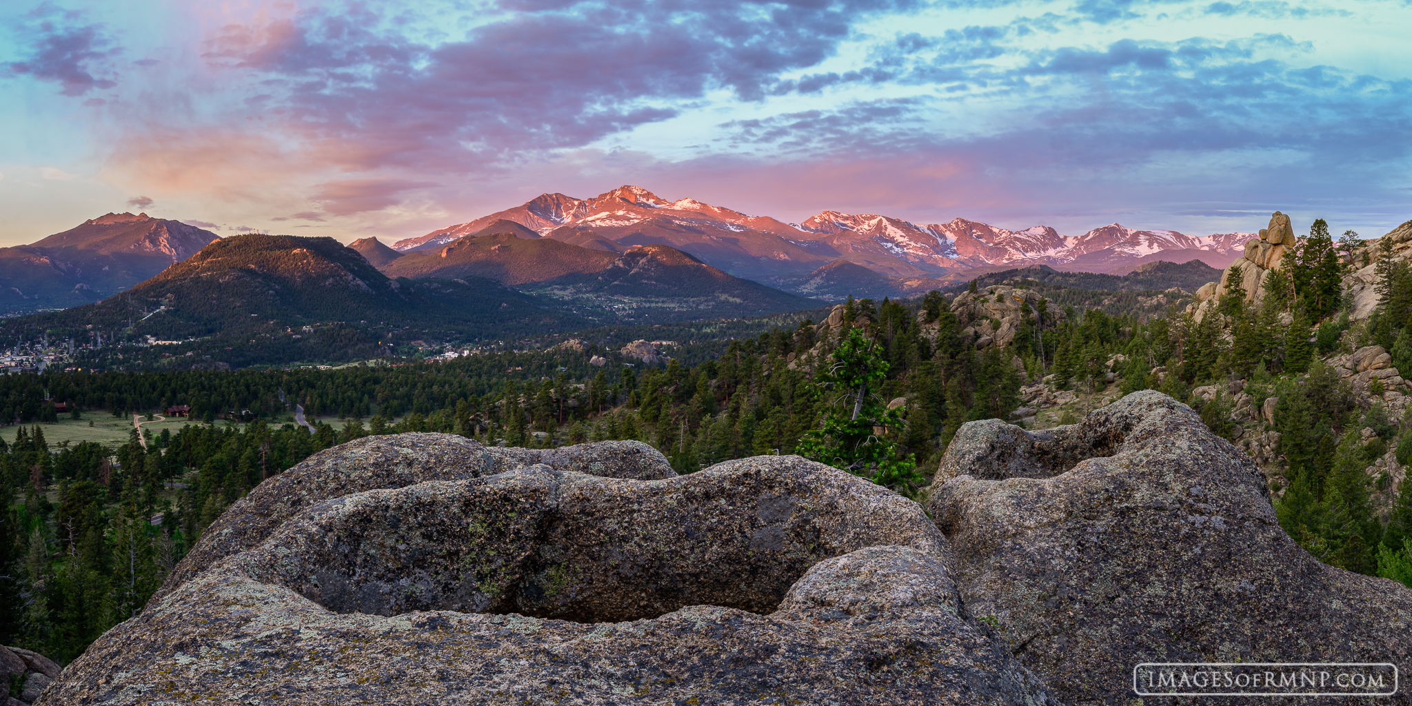 These granite potholes almost look like little volcanoes, perched high above the Estes Valley on a warm spring morning as Longs...