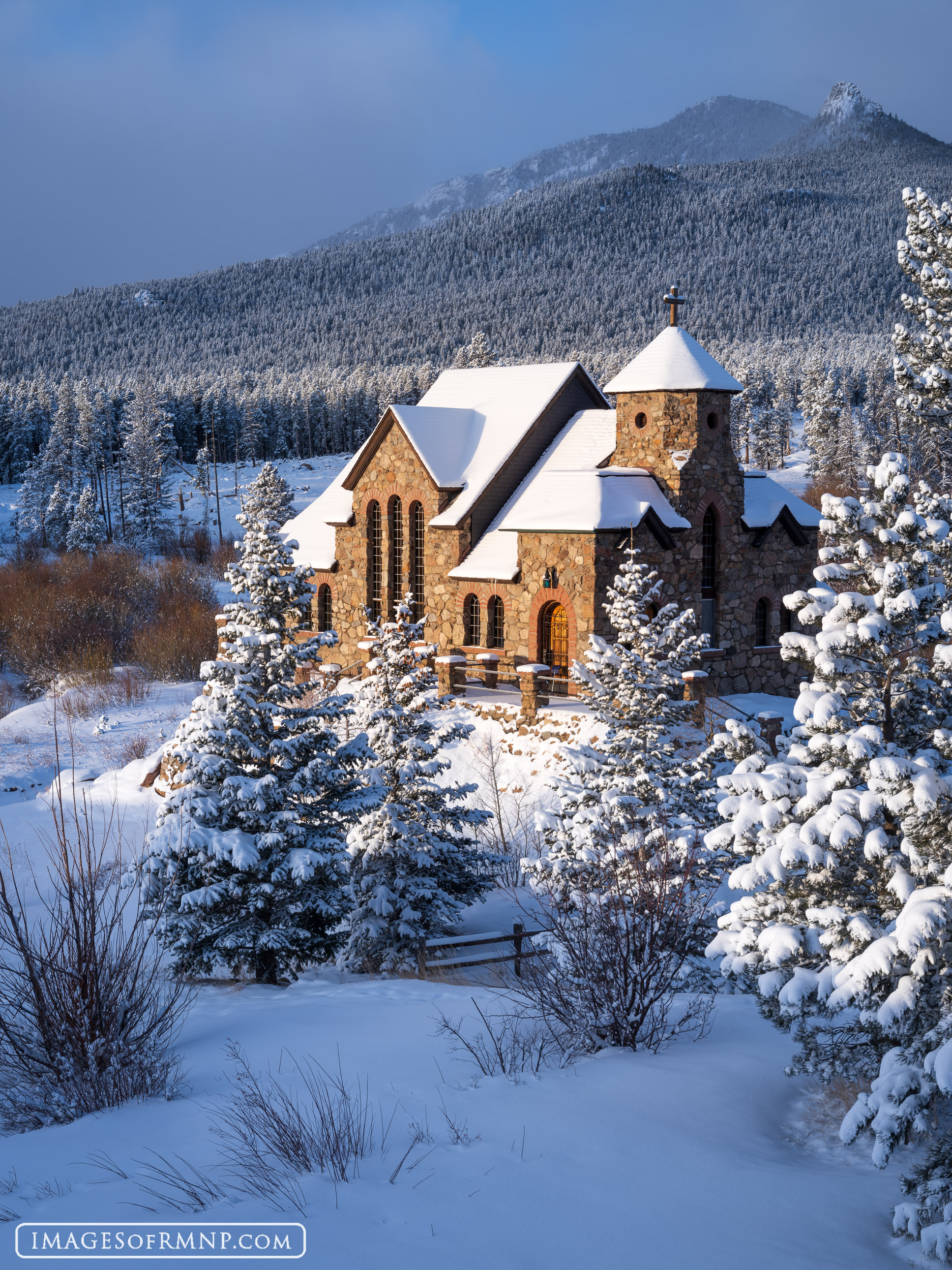 The warm light of the rising sun illuminates the little church of Saint Catherine on a cold and snowy winter's morning. In the...